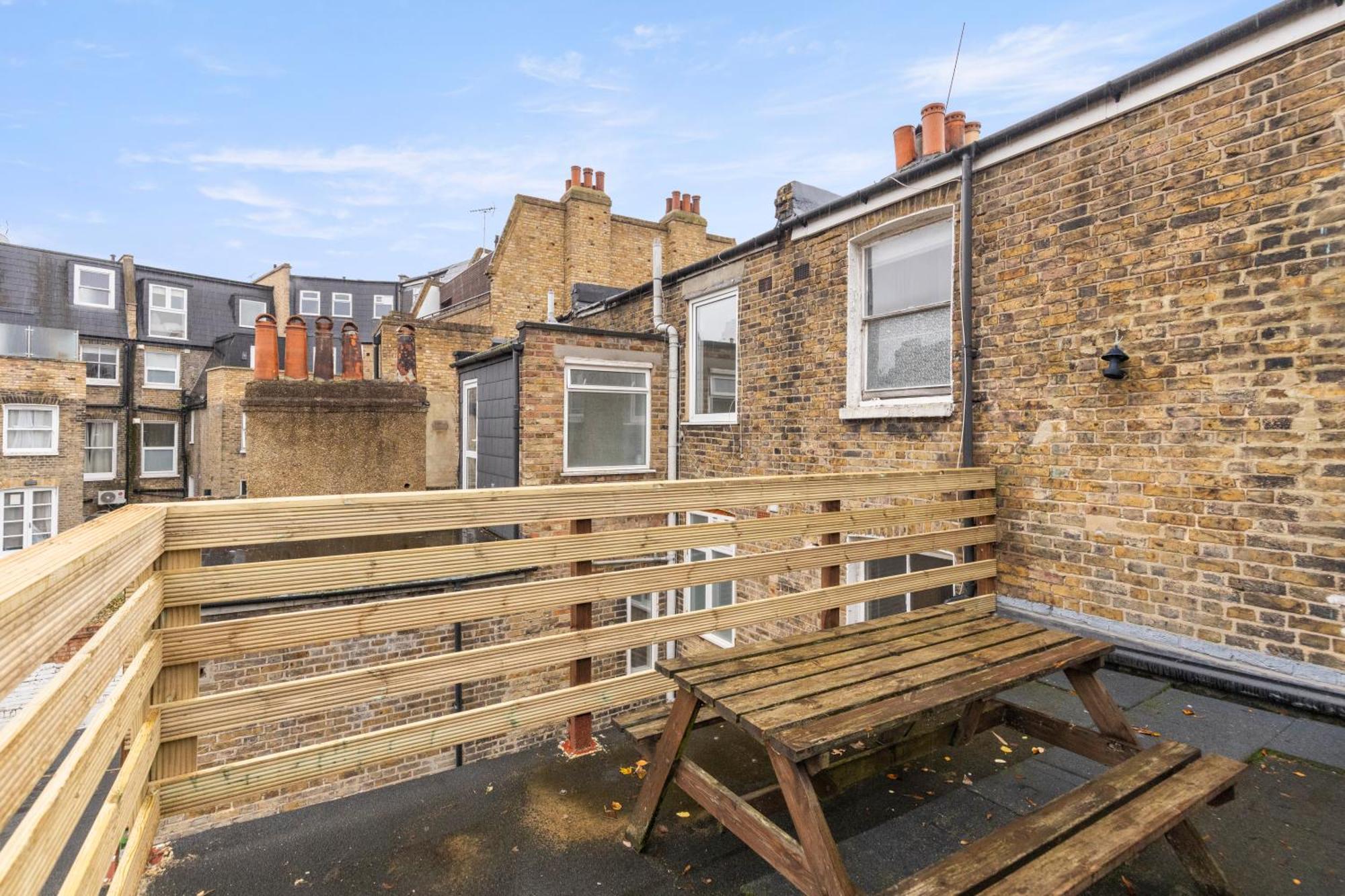 Appartement Bright & Airy Rooftop In